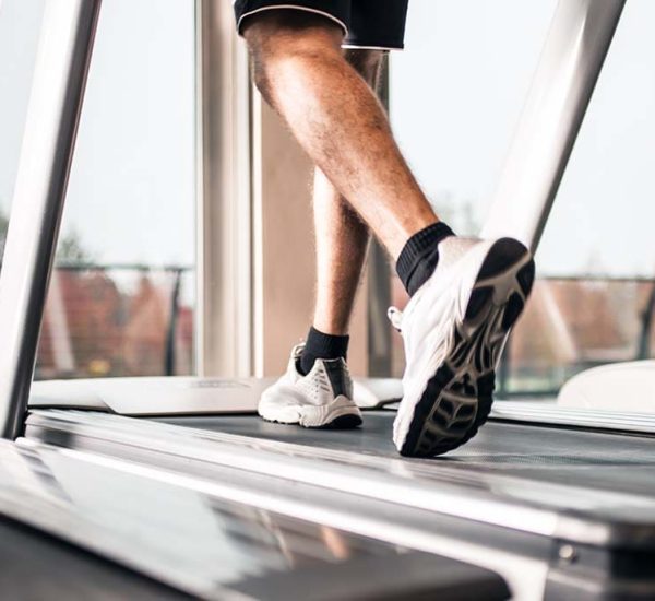 Man running on a treadmill